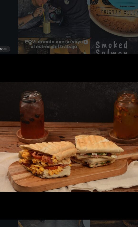 Hot panini sandwiches on a wooden board